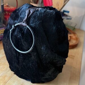 Hi Vintage Muff black seal or beaver fur excellent condition goose down padding.